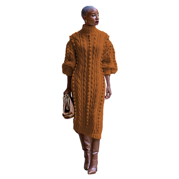 Woman wearing a brown knitted dress and boots on a white background