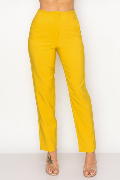 Mustard yellow pants on a white background