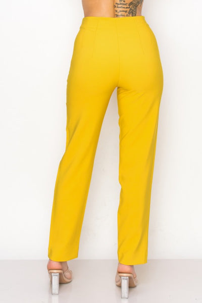 Mustard yellow pants on a white background