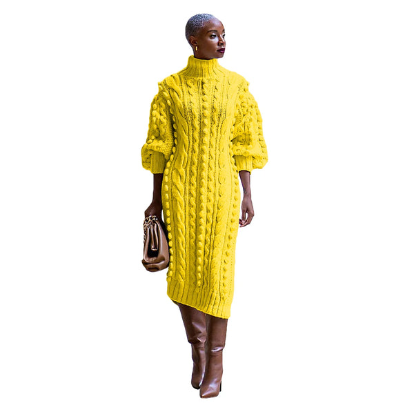 Woman wearing a bright yellow cable knit dress on a white background