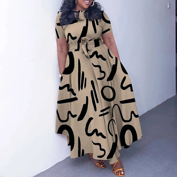 SlayEdgeBoutique beige short sleeve maxi dress with black abstract print, asymmetrical hem, and waist tie.