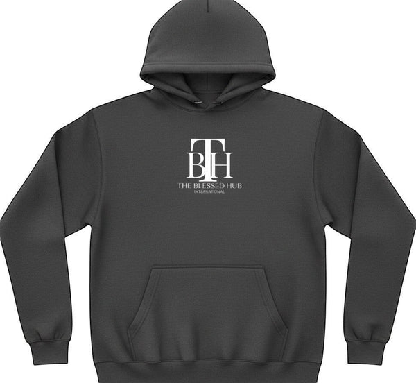 SlayEdgeBoutique black pullover hoodie with The Blessed Hub International logo, kangaroo pocket, and drawstring hood.
