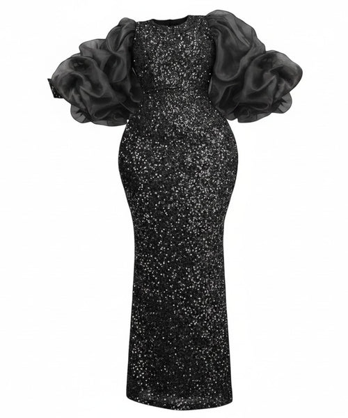 SlayEdgeBoutique black floor-length evening gown with all-over sequins and dramatic voluminous organza puff sleeves.