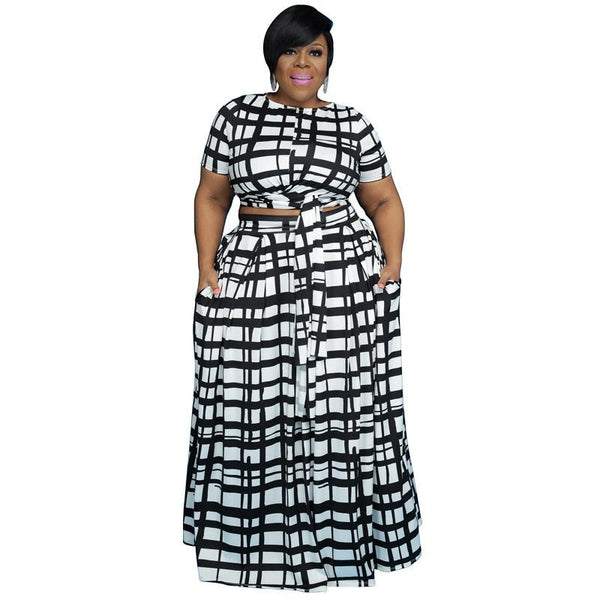 SlayEdgeBoutique black and white grid print two-piece crop top and maxi skirt set with tie-waist and side pockets.