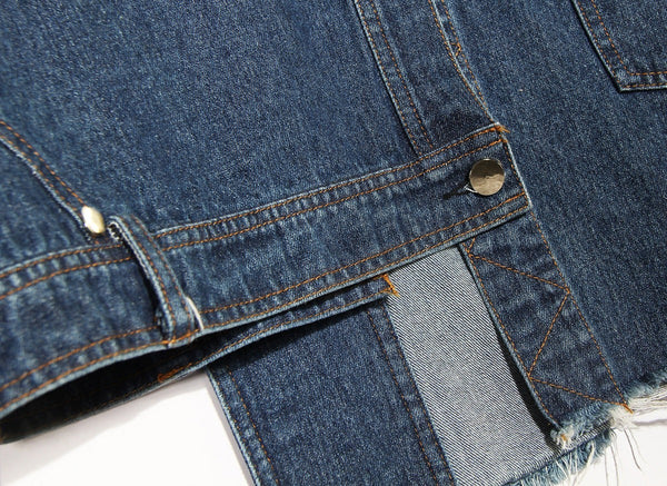 SlayEdgeBoutique blue denim patchwork sweatshirt featuring a raw hem and metallic button detail