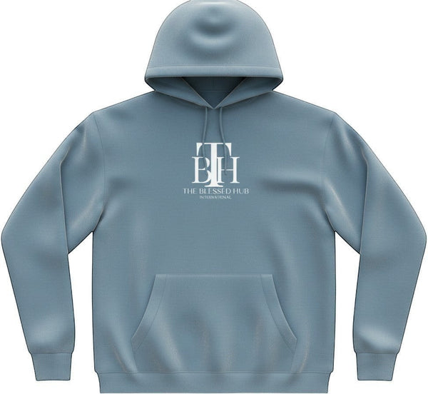 SlayEdgeBoutique blue pullover hoodie with The Blessed Hub International logo, kangaroo pocket, and drawstring hood.