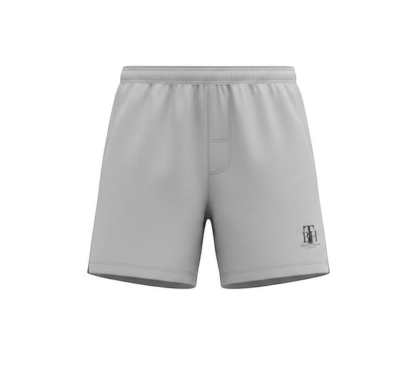 SlayEdgeBoutique light grey athletic performance shorts with THE BLESSED HUB INTERNATIONAL logo on the leg.