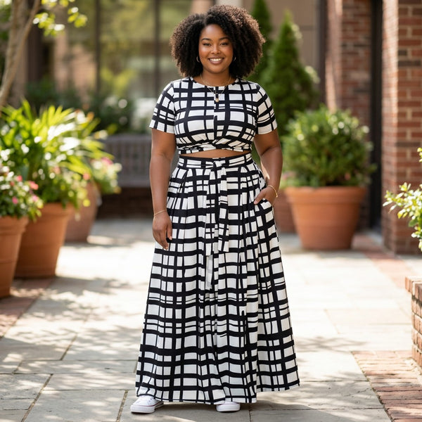 SlayEdgeBoutique two-piece set featuring a black and white grid print crop top and high-waisted maxi skirt with pockets