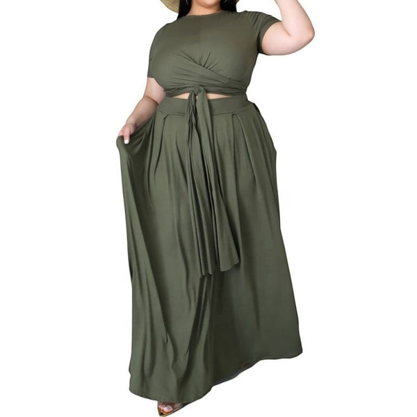SlayEdgeBoutique olive green two-piece set with a short-sleeve tie-front crop top and a high-waisted flowy maxi skirt.