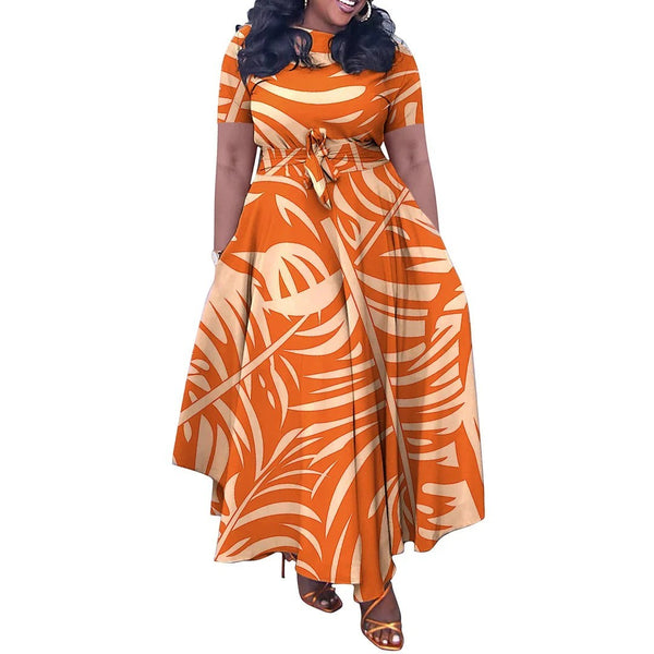 SlayEdgeBoutique orange and cream leaf print short sleeve maxi dress with an asymmetrical hem and adjustable waist tie.