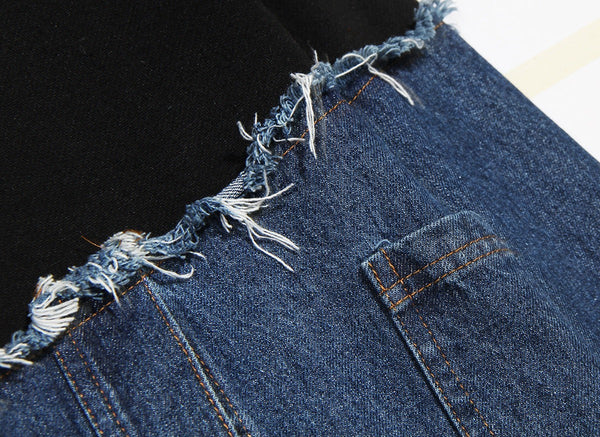 SlayEdgeBoutique motorcycle pullover featuring black fabric and blue denim patchwork with a raw frayed edge detail.