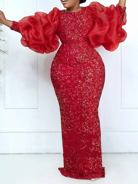 SlayEdgeBoutique red floor-length evening gown with all-over sequins and dramatic voluminous organza puff sleeves.